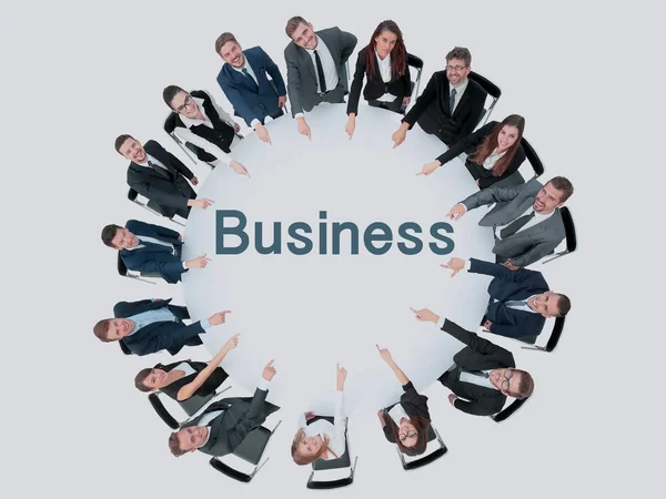 Happy business team pointing at something — Stock Photo, Image