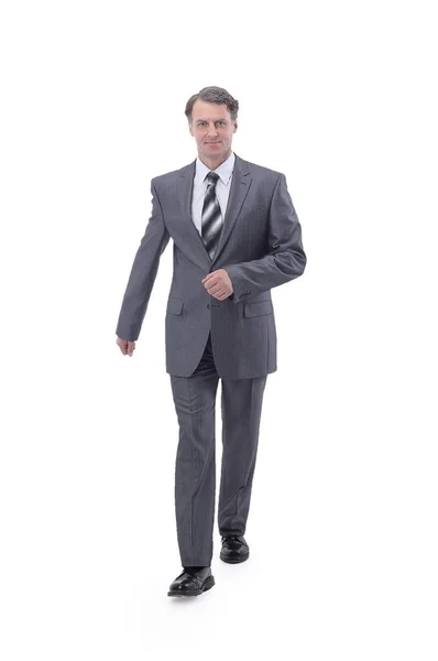 In all growth.a successful businessman, confidently striding forward. — Stock Photo, Image