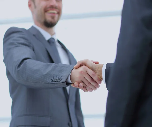 Close up photo of the happy successful businessmen shaking hands — Stock Photo, Image