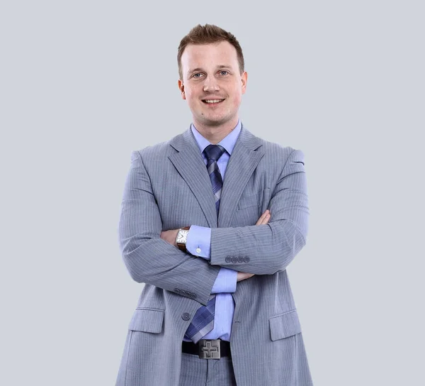 Junger Manager lächelt isoliert auf grauem Hintergrund — Stockfoto