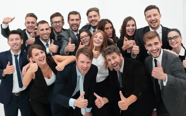 Успешная бизнес-команда показывает большие пальцы вверх — стоковое фото