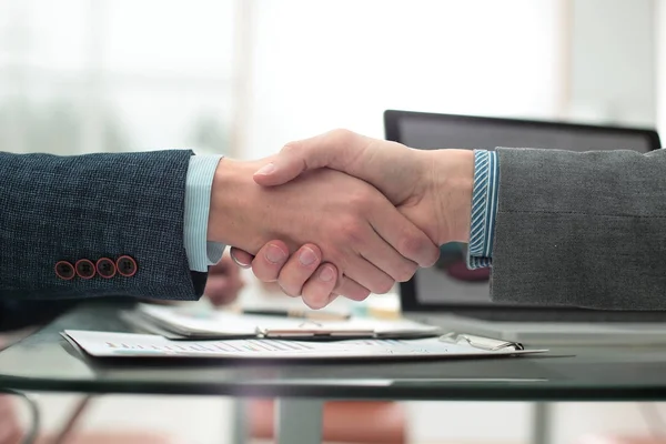 Businessman shaking hands to seal a deal with his partner — Stock Photo, Image