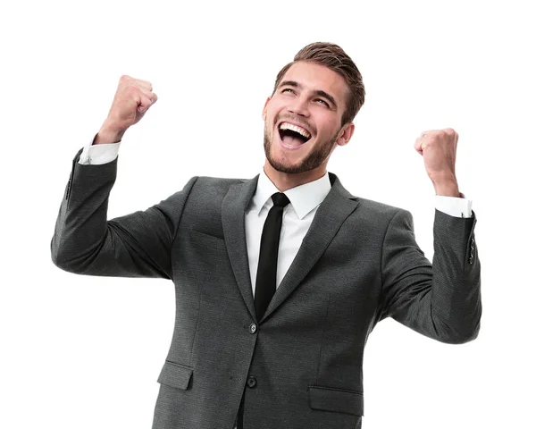 Бізнесмен святкує зі своїми кулаками, піднятими в повітрі і — стокове фото