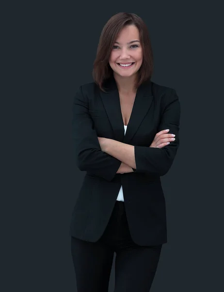 Feliz mujer de negocios vistiendo traje negro de pie y brazos plegables —  Fotos de Stock