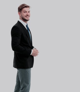 Beyaz arka plan üzerinde gülümseyen bir işadamı, yan görünüm