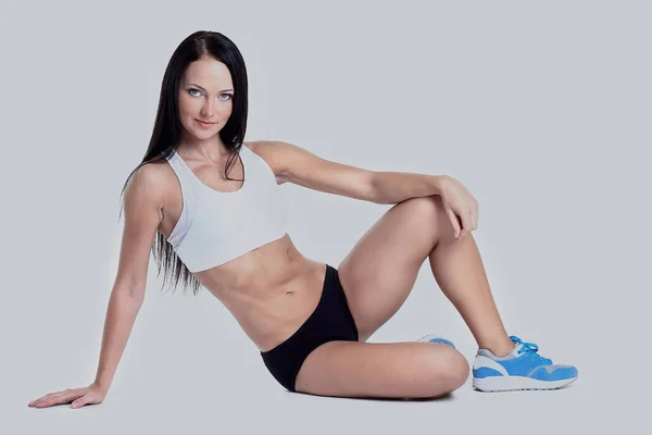 Woman wearing sportswear over white background — Stock Photo, Image