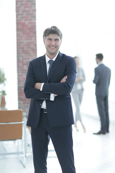 Portrait of a smiling confident businessman — Stock Photo, Image
