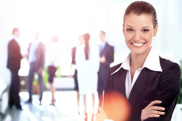 Portrait of a business woman looking happy and smiling — Stock Photo, Image