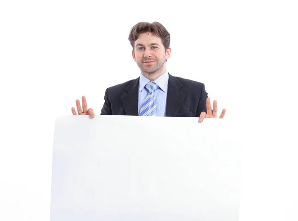Empresário segurando um cartaz em branco — Fotografia de Stock