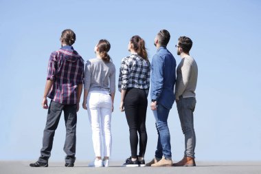 arka view.a bir grup genç insan kopya alanı seyir