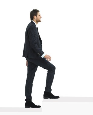 tam growth.businessman bir adım forward.isolated beyaz alarak.