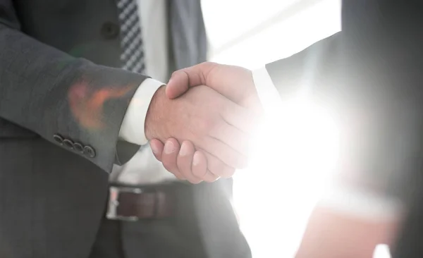 Businessman giving his hand for handshake to partner — Stock Photo, Image