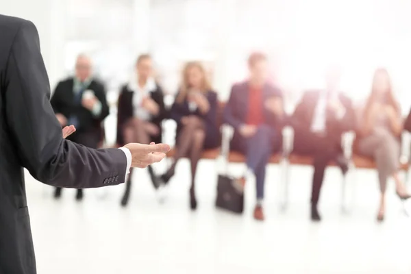 Member of the business team asks a question to the speaker at a — Stock Photo, Image