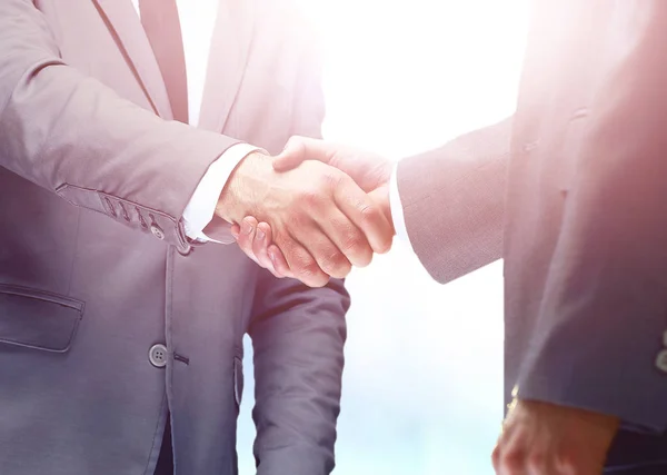 Handshake between two caucasian businessman — Stock Photo, Image