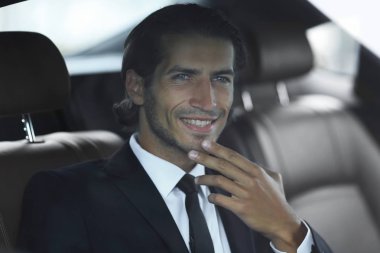 arabada oturan closeup.successful iş adamı