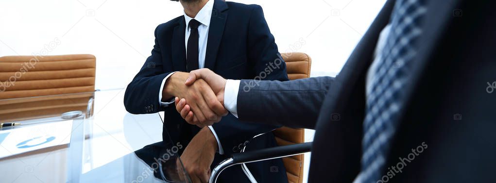 bottom view. confident handshake of business partners