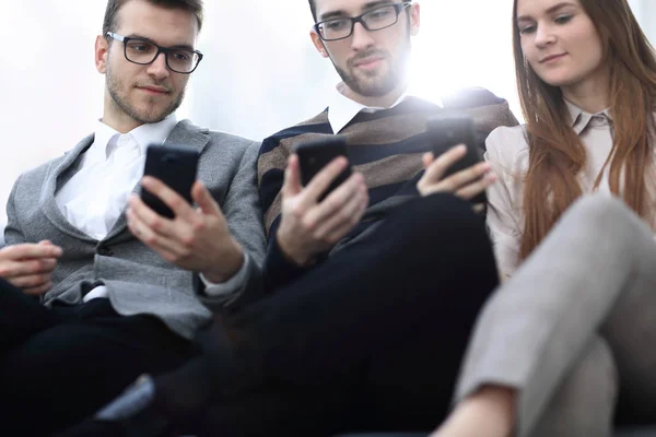 Closeup. employees talking in the workplace — Stock Photo, Image