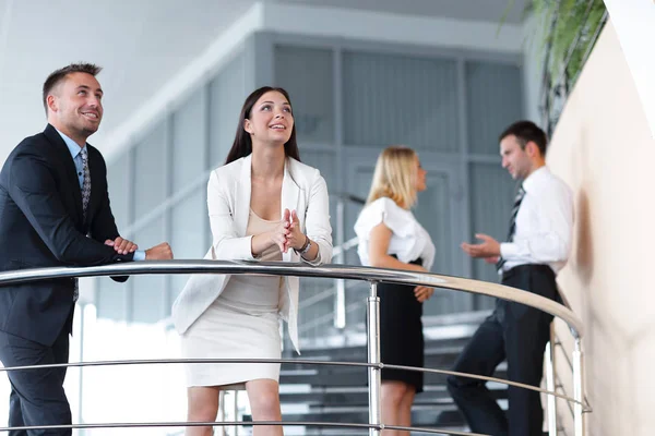 Business team in a break from work, standing on the terrace of the office. — Stock Photo, Image