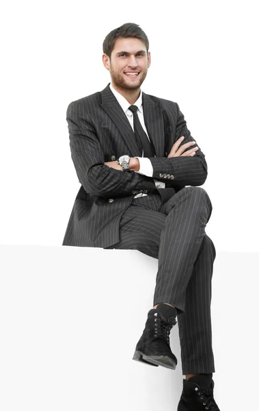 Porträt eines gutaussehenden Geschäftsmannes auf einem Stuhl — Stockfoto