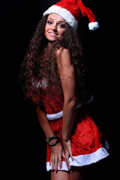 Mooie vrouw draagt santa clausule kostuum — Stockfoto