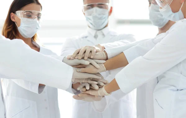 Close-up Photo Of Doctors Stacking Hand With Coworkers — Stock Photo, Image