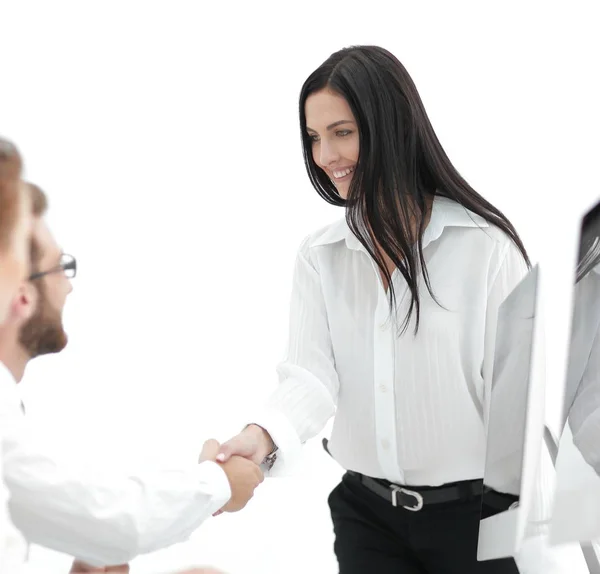 Jonge zakenvrouw schudden handen met een collega — Stockfoto