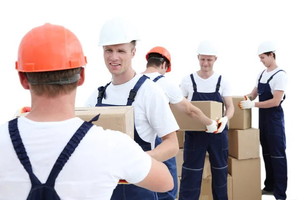 Grupo de pessoas construtores com caixas — Fotografia de Stock