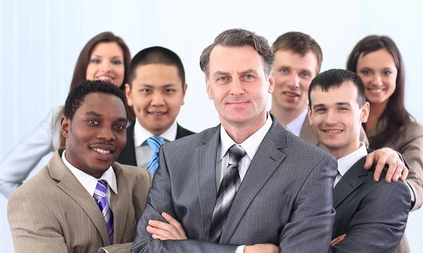 Hombre de negocios y equipo empresarial cohesivo — Foto de Stock