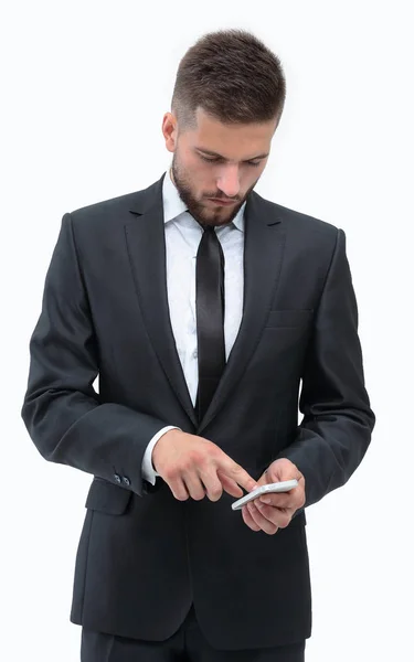 Hombre de negocios haciendo SMS en un teléfono inteligente . —  Fotos de Stock