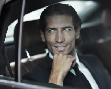 arabada oturan closeup.successful iş adamı