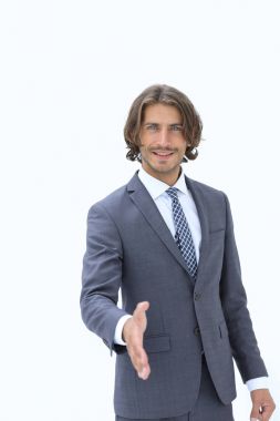 Gülümseyen dost canlısı iş adamı el sıkışmayı teklif ediyor