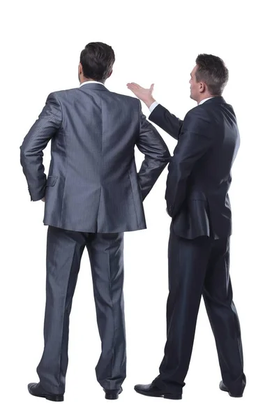 Vista trasera de dos hombres de negocios apuntando hacia adelante — Foto de Stock