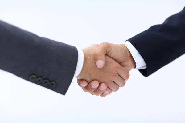 Closeup of business people shaking hands over a deal — Stock Photo, Image