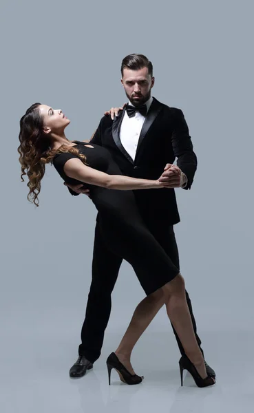 Passion dancers over grey background — Stock Photo, Image