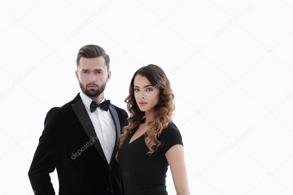 Portrait of a handsome man looking at the camera with a woman