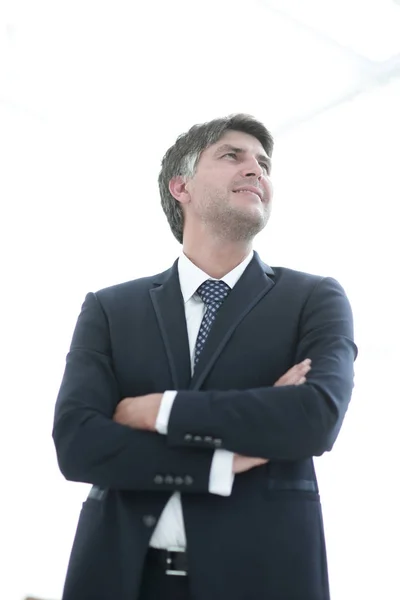 Photo of an attractive businessman with his arms crossed — Stock Photo, Image