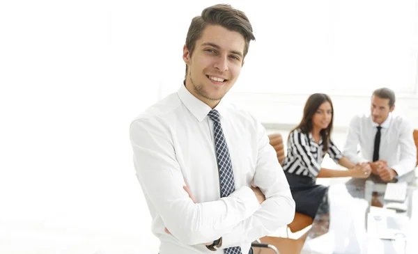 Successful businessman on background of office. — Stock Photo, Image