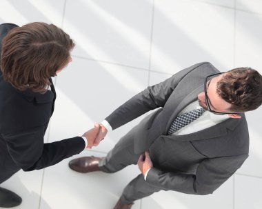 İş tokalaşması ve iş adamları kavramları.