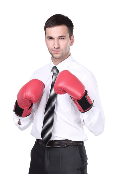 Business man with boxing gloves is ready for corporate battle. Royalty Free Stock Photos