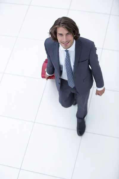 Blick von oben. Geschäftsmann mit Gepäck — Stockfoto
