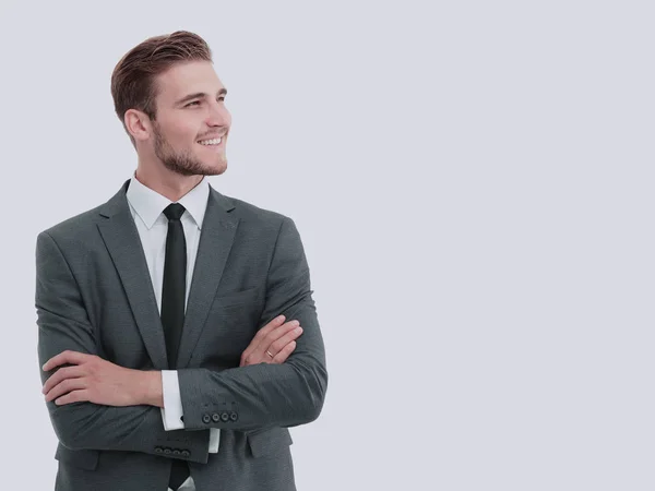 Bonito empresário de pé isolado no fundo branco — Fotografia de Stock