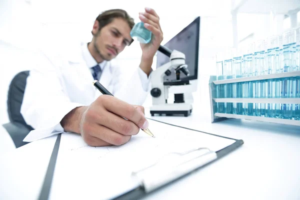scientist analyzing an experiment in a laboratory