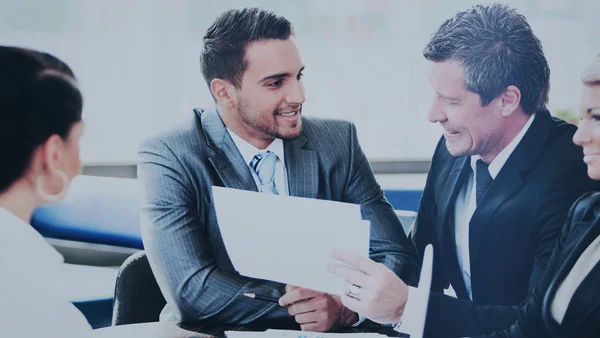 Image of business partners discussing documents and ideas at meeting — Stock Photo, Image