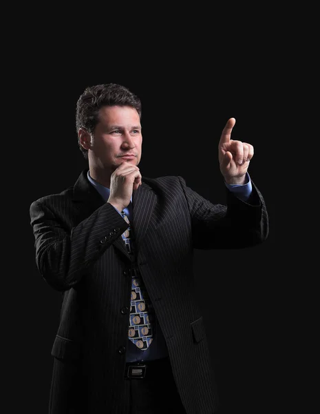 Confident businessman pointing at a blank space — Stock Photo, Image