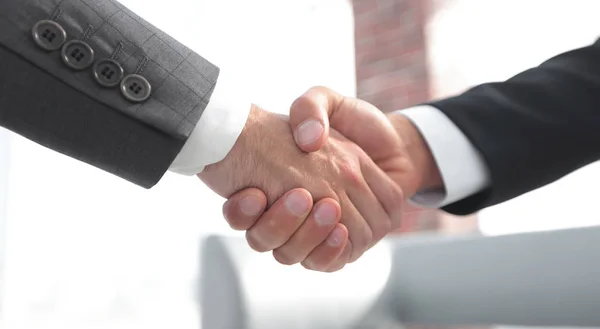 Closeup.handshake de parceiros de negócios — Fotografia de Stock