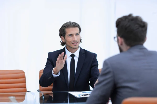 Business partners discussing issues sitting — Stock Photo, Image