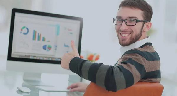 Handsome young man wearing glasses and working with modern compu — Stock Photo, Image