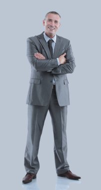 Olgun iş adam silah üzerinde izole gri katlanmış.