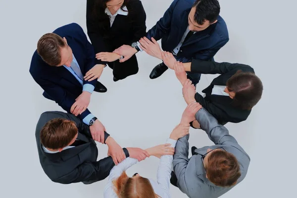 Podnikatelé s rukama společně v kruhu — Stock fotografie