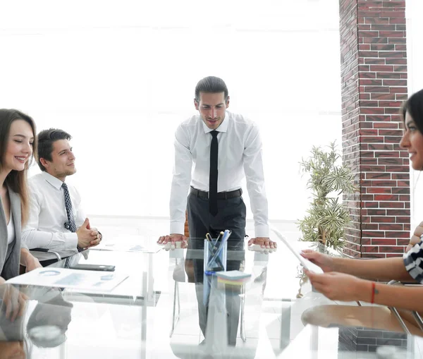 Businessman at meeting with business team — Stock Photo, Image